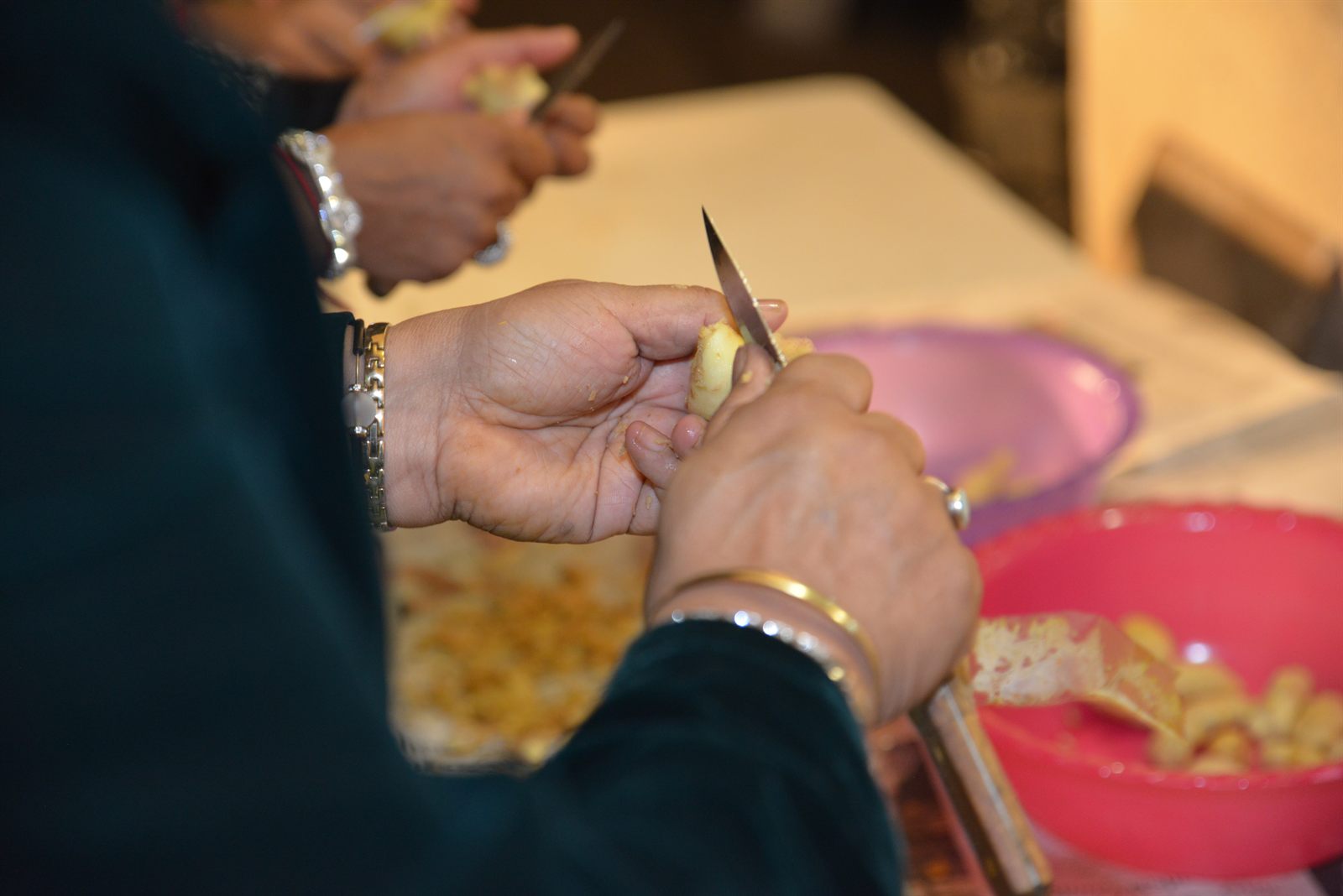 Hands at work during wedding morning preparations