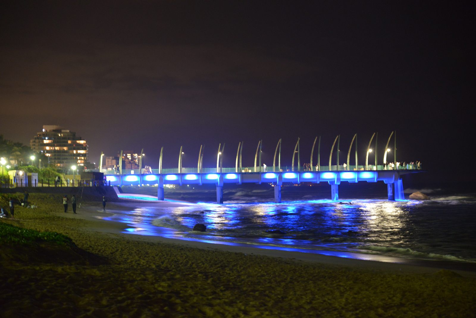Lights reflecting on the water at night
